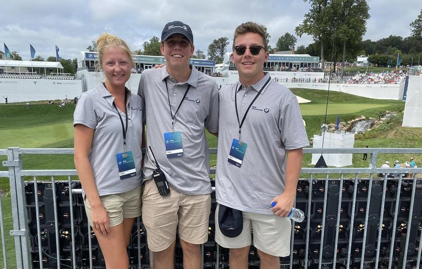 Brendan and two fellow volunteers in BMW Championship polos at the 16th-green skybox, Caves Valley Golf Club, 2021